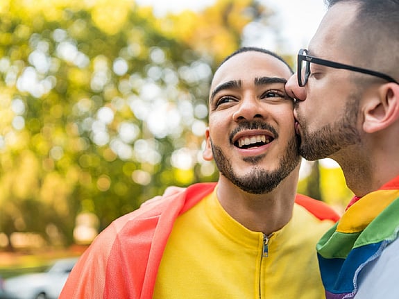 Gay couple embracing each other